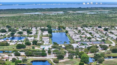 This open and spacious 2 bdrm/ 2 bath home features laminate & on Savanna Golf Club in Florida - for sale on GolfHomes.com, golf home, golf lot