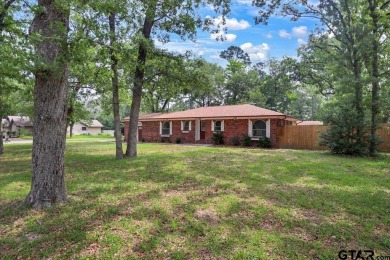 Welcome to your serene retreat in the gated community of on Hide-A-Way Lake Golf Course in Texas - for sale on GolfHomes.com, golf home, golf lot