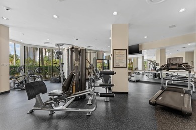 Experience penthouse living with breathtaking golf and city on The President Country Club in Florida - for sale on GolfHomes.com, golf home, golf lot