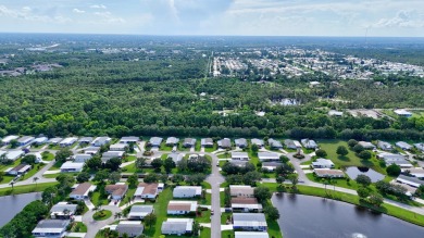 This open and spacious 2 bdrm/ 2 bath home features laminate & on Savanna Golf Club in Florida - for sale on GolfHomes.com, golf home, golf lot