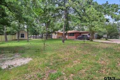 Welcome to your serene retreat in the gated community of on Hide-A-Way Lake Golf Course in Texas - for sale on GolfHomes.com, golf home, golf lot