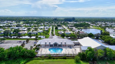 This open and spacious 2 bdrm/ 2 bath home features laminate & on Savanna Golf Club in Florida - for sale on GolfHomes.com, golf home, golf lot