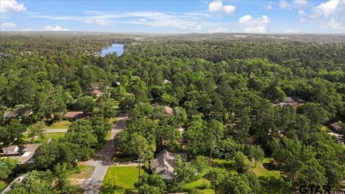 Welcome to your serene retreat in the gated community of on Hide-A-Way Lake Golf Course in Texas - for sale on GolfHomes.com, golf home, golf lot