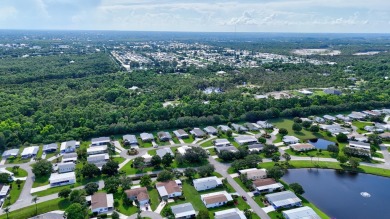 This open and spacious 2 bdrm/ 2 bath home features laminate & on Savanna Golf Club in Florida - for sale on GolfHomes.com, golf home, golf lot