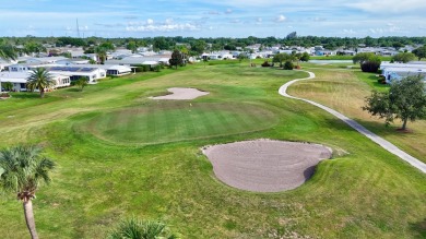 This open and spacious 2 bdrm/ 2 bath home features laminate & on Savanna Golf Club in Florida - for sale on GolfHomes.com, golf home, golf lot