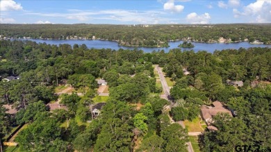 Welcome to your serene retreat in the gated community of on Hide-A-Way Lake Golf Course in Texas - for sale on GolfHomes.com, golf home, golf lot