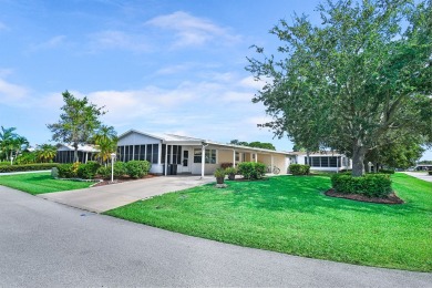 This open and spacious 2 bdrm/ 2 bath home features laminate & on Savanna Golf Club in Florida - for sale on GolfHomes.com, golf home, golf lot