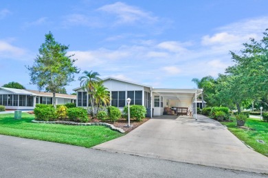 This open and spacious 2 bdrm/ 2 bath home features laminate & on Savanna Golf Club in Florida - for sale on GolfHomes.com, golf home, golf lot