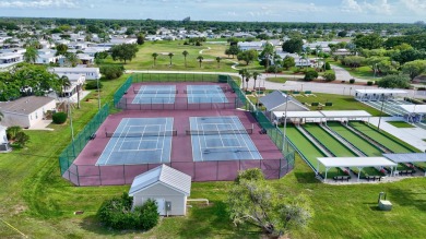 This open and spacious 2 bdrm/ 2 bath home features laminate & on Savanna Golf Club in Florida - for sale on GolfHomes.com, golf home, golf lot