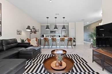 INCOME READY INVESTMENT OPPORTUNITY!! 4 bedroom/3 bath POOL home on ChampionsGate Golf Resort in Florida - for sale on GolfHomes.com, golf home, golf lot