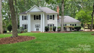 Experience luxury living in one of South Charlotte's most on Raintree Country Club in North Carolina - for sale on GolfHomes.com, golf home, golf lot