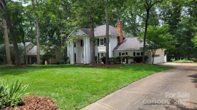 Experience luxury living in one of South Charlotte's most on Raintree Country Club in North Carolina - for sale on GolfHomes.com, golf home, golf lot