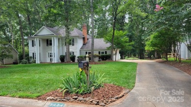 Experience luxury living in one of South Charlotte's most on Raintree Country Club in North Carolina - for sale on GolfHomes.com, golf home, golf lot