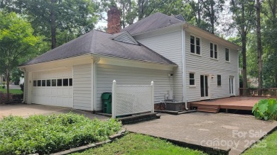 Experience luxury living in one of South Charlotte's most on Raintree Country Club in North Carolina - for sale on GolfHomes.com, golf home, golf lot