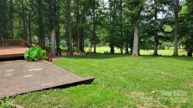 Experience luxury living in one of South Charlotte's most on Raintree Country Club in North Carolina - for sale on GolfHomes.com, golf home, golf lot