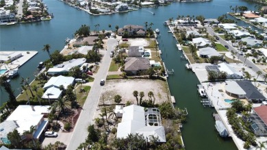 Here is your perfect chance to build your dream waterfront home on Key Royale Club in Florida - for sale on GolfHomes.com, golf home, golf lot