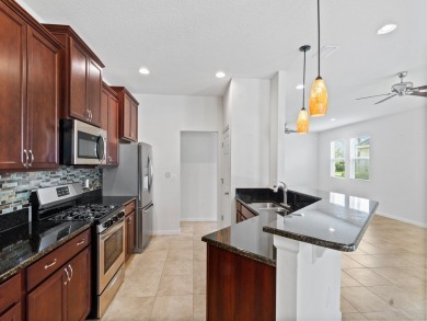 Newer built 4 bedroom, 2 bath with 25 ft deep garage in Pointe on The Club At Pointe West in Florida - for sale on GolfHomes.com, golf home, golf lot