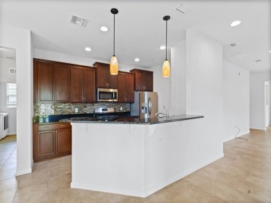 Newer built 4 bedroom, 2 bath with 25 ft deep garage in Pointe on The Club At Pointe West in Florida - for sale on GolfHomes.com, golf home, golf lot