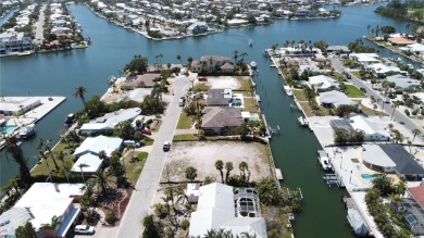 Here is your perfect chance to build your dream waterfront home on Key Royale Club in Florida - for sale on GolfHomes.com, golf home, golf lot
