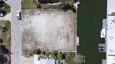 Here is your perfect chance to build your dream waterfront home on Key Royale Club in Florida - for sale on GolfHomes.com, golf home, golf lot