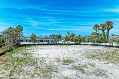 Here is your perfect chance to build your dream waterfront home on Key Royale Club in Florida - for sale on GolfHomes.com, golf home, golf lot