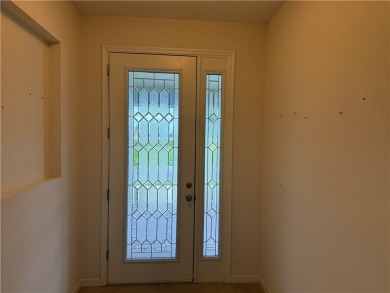 Newer built 4 bedroom, 2 bath with 25 ft deep garage in Pointe on The Club At Pointe West in Florida - for sale on GolfHomes.com, golf home, golf lot