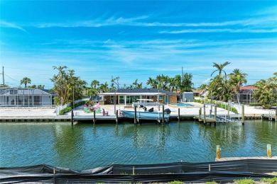 Here is your perfect chance to build your dream waterfront home on Key Royale Club in Florida - for sale on GolfHomes.com, golf home, golf lot