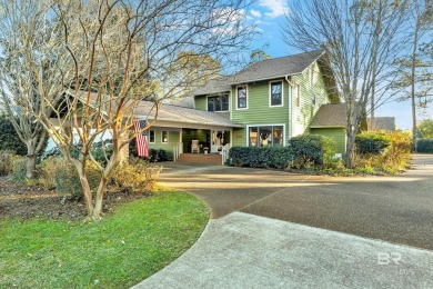 Nestled in the heart of Gulf Shores, this charming two-story on The Golf Club of the Wharf in Alabama - for sale on GolfHomes.com, golf home, golf lot