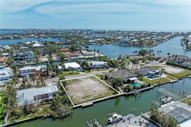 Here is your perfect chance to build your dream waterfront home on Key Royale Club in Florida - for sale on GolfHomes.com, golf home, golf lot