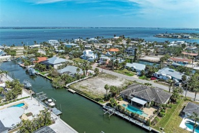 Here is your perfect chance to build your dream waterfront home on Key Royale Club in Florida - for sale on GolfHomes.com, golf home, golf lot