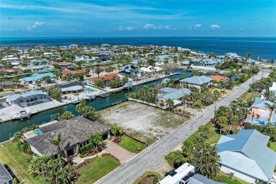 Here is your perfect chance to build your dream waterfront home on Key Royale Club in Florida - for sale on GolfHomes.com, golf home, golf lot