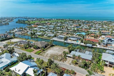 Here is your perfect chance to build your dream waterfront home on Key Royale Club in Florida - for sale on GolfHomes.com, golf home, golf lot