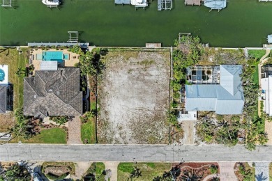Here is your perfect chance to build your dream waterfront home on Key Royale Club in Florida - for sale on GolfHomes.com, golf home, golf lot