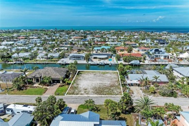 Here is your perfect chance to build your dream waterfront home on Key Royale Club in Florida - for sale on GolfHomes.com, golf home, golf lot