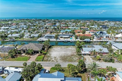 Here is your perfect chance to build your dream waterfront home on Key Royale Club in Florida - for sale on GolfHomes.com, golf home, golf lot
