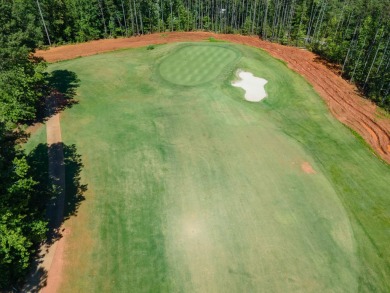 Nestled in the sought-after Woodfin Ridge Golf Course community on Woodfin Ridge Golf Club in South Carolina - for sale on GolfHomes.com, golf home, golf lot