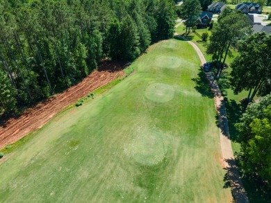 Nestled in the sought-after Woodfin Ridge Golf Course community on Woodfin Ridge Golf Club in South Carolina - for sale on GolfHomes.com, golf home, golf lot