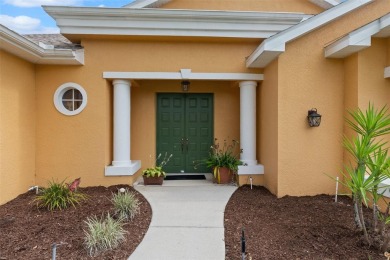 Stunning Custom-Built Palmwood Courtyard Home Nestled In The on Silverthorn Country Club in Florida - for sale on GolfHomes.com, golf home, golf lot