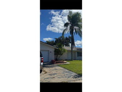 Welcome to this charming residence located at 2421 Archer Blvd on Wedgefield Golf Club in Florida - for sale on GolfHomes.com, golf home, golf lot