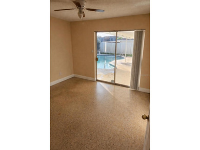 Welcome to this charming residence located at 2421 Archer Blvd on Wedgefield Golf Club in Florida - for sale on GolfHomes.com, golf home, golf lot