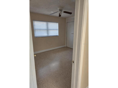 Welcome to this charming residence located at 2421 Archer Blvd on Wedgefield Golf Club in Florida - for sale on GolfHomes.com, golf home, golf lot