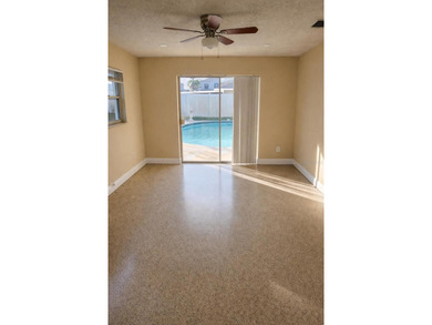 Welcome to this charming residence located at 2421 Archer Blvd on Wedgefield Golf Club in Florida - for sale on GolfHomes.com, golf home, golf lot