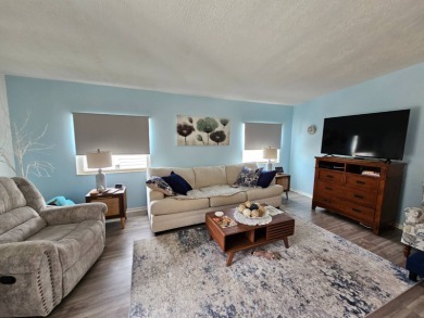 This home is located on leased land in a 55+ resort-style MH on Big Cypress Golf and Country Club in Florida - for sale on GolfHomes.com, golf home, golf lot