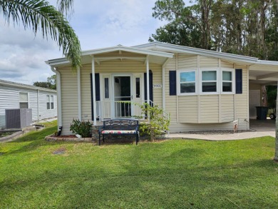 This home is located on leased land in a 55+ resort-style MH on Big Cypress Golf and Country Club in Florida - for sale on GolfHomes.com, golf home, golf lot