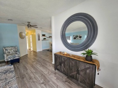 This home is located on leased land in a 55+ resort-style MH on Big Cypress Golf and Country Club in Florida - for sale on GolfHomes.com, golf home, golf lot
