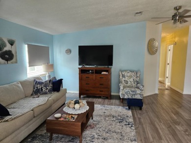 This home is located on leased land in a 55+ resort-style MH on Big Cypress Golf and Country Club in Florida - for sale on GolfHomes.com, golf home, golf lot