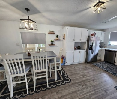 This home is located on leased land in a 55+ resort-style MH on Big Cypress Golf and Country Club in Florida - for sale on GolfHomes.com, golf home, golf lot