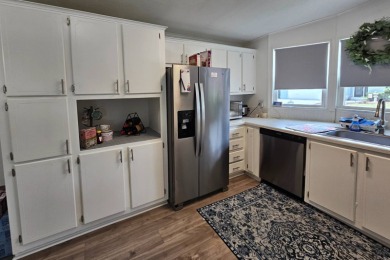 This home is located on leased land in a 55+ resort-style MH on Big Cypress Golf and Country Club in Florida - for sale on GolfHomes.com, golf home, golf lot