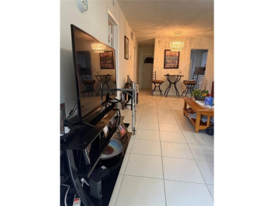Beautifully maintained 2-bedroom, 1-bath first-floor condo with on Leisureville Community Association in Florida - for sale on GolfHomes.com, golf home, golf lot