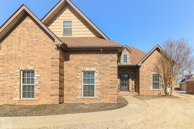 Stunning updated executive home with sunroom and screened porch on Sage Meadows Golf Course in Arkansas - for sale on GolfHomes.com, golf home, golf lot